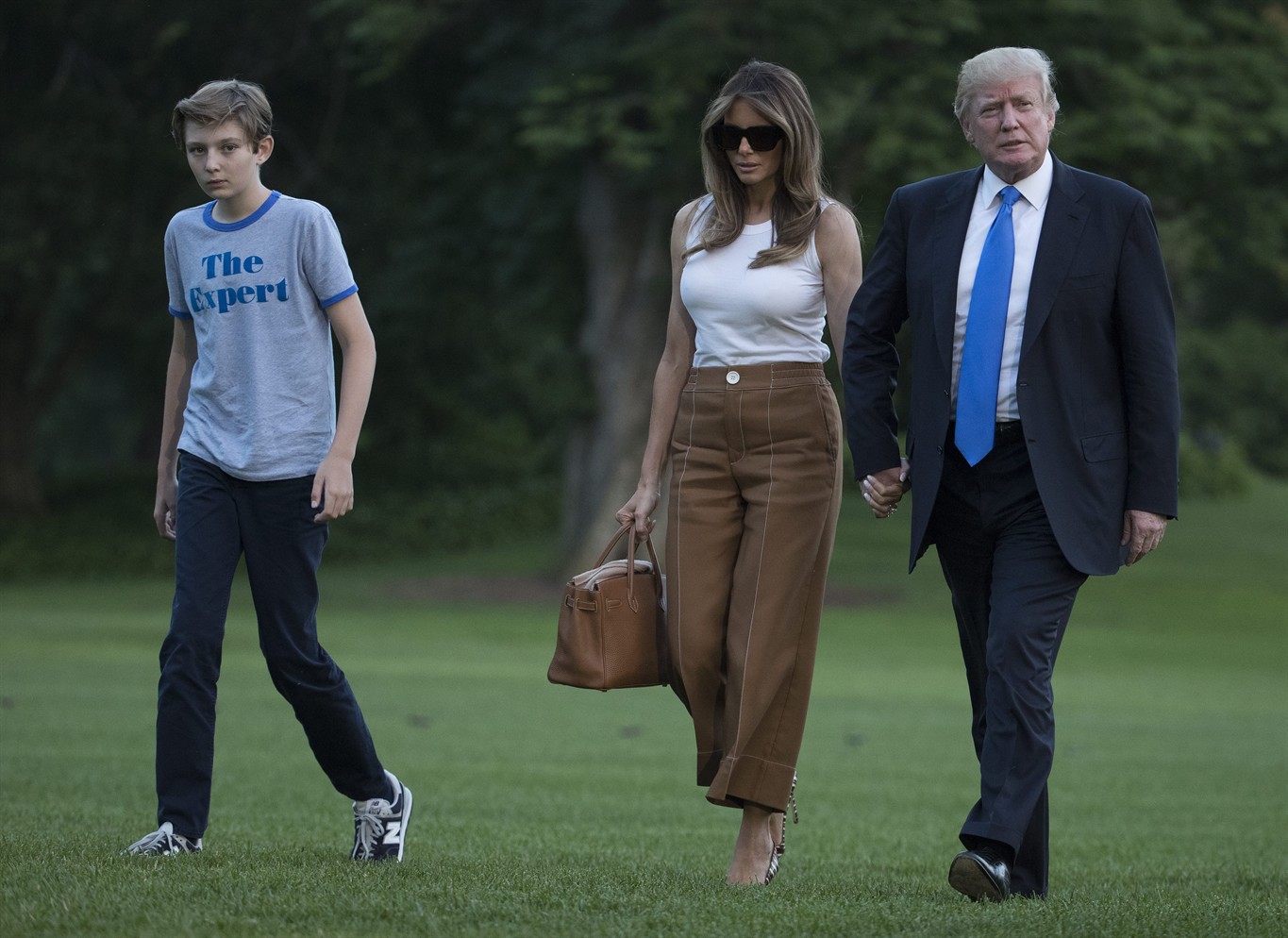 Melania, Barron Trump move into White House