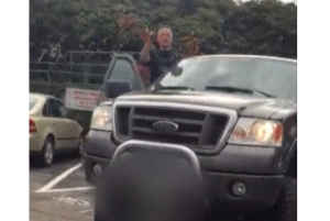 A man shouts the words "white power" at a man filming a racially offensive argument in Abbotsford. 